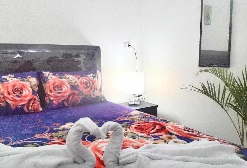 Economy Quadruple Room, Balige J&j Guest House 2