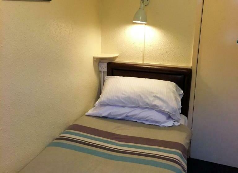 اتاق استاندارد یک تخته با سرویس بهداشتی مشترک, Redbeck Motel