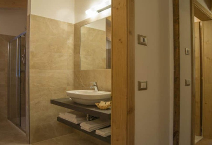 سوییت جونیور, Garni Caminetto