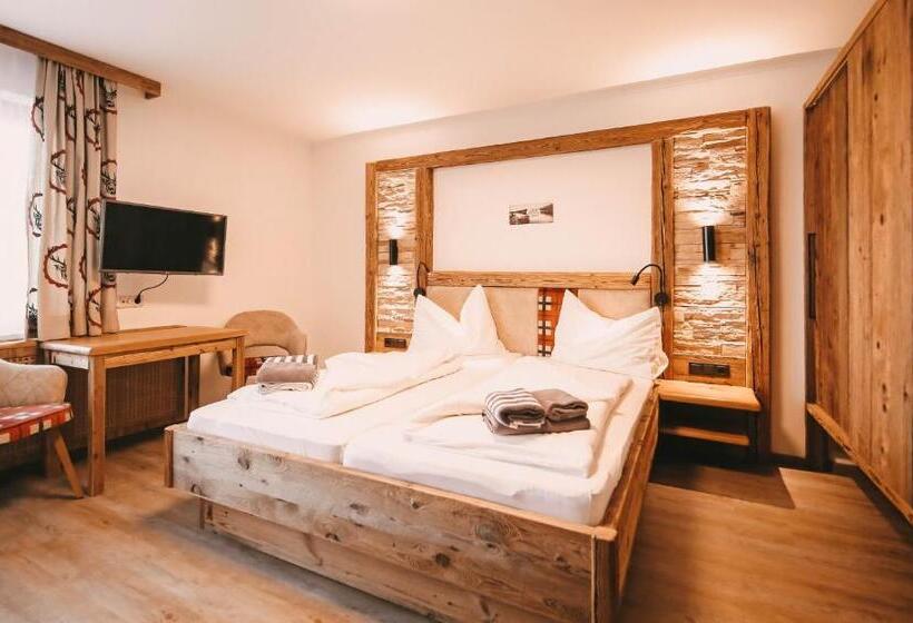 اتاق خانوادگی با چشم‌انداز کوه, Posers Bergwelt B&b