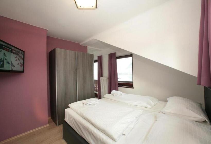 Suite with lake view, Lake And Cityhotel Edelweiss   Self Check In