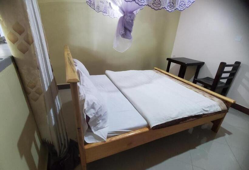 اتاق استاندارد یک نفره, Bigodi Community Lodge