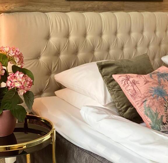 سوییت با چشم‌انداز دریا, Strand City Hotell