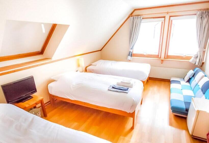 اتاق استاندارد سه تخته با سرویس بهداشتی مشترک, Rusutsu Lodges Pension Lilla Huset