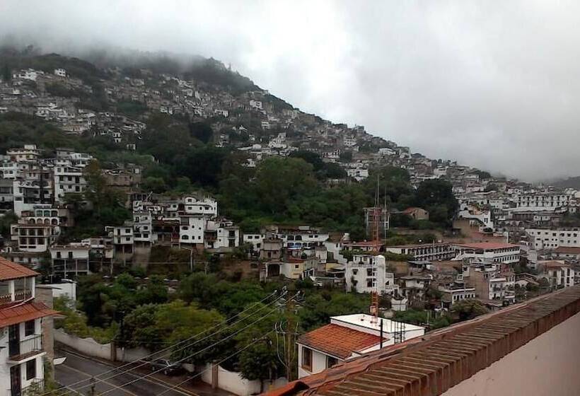 اتاق اکونومی, El ángel Taxco