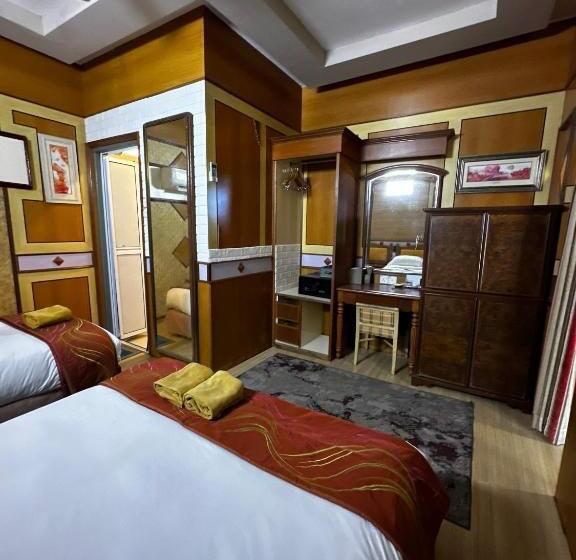 اتاق استاندارد سه تخته با چشم‌انداز باغ, Shari La Perhentian Island Resort