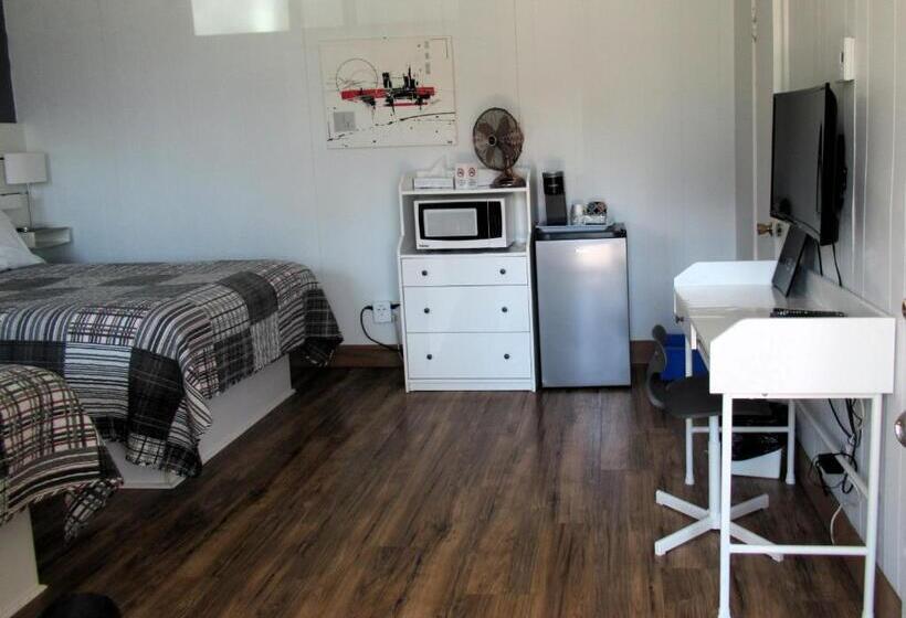 اتاق استاندارد چهار تخته با چشم‌انداز دریا, Motel Et Chalet Natabel