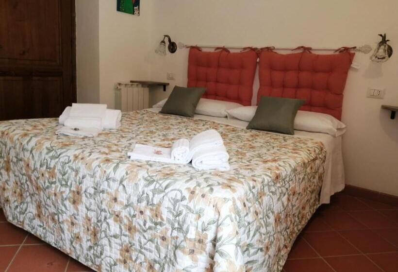 اتاق استاندارد چهارنفره با سرویس بهداشتی مشترک, B&b 8380 Saturnia Terme