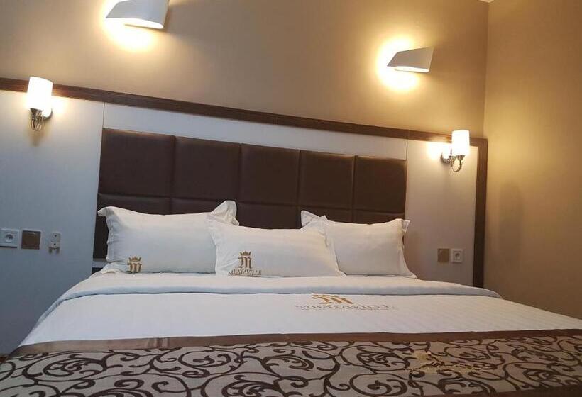 اتاق لوکس, Mbayaville