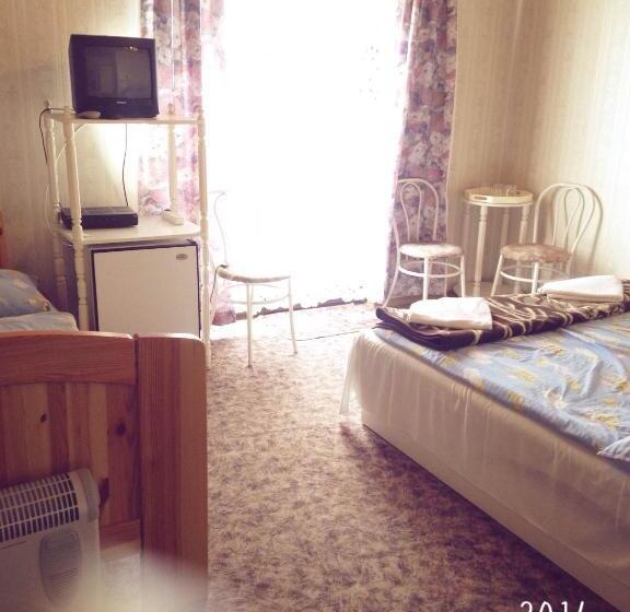 اتاق استاندارد سه تخته با بالکن, Steinhaus Bed & Breakfast