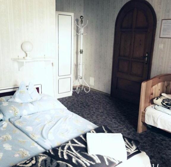 اتاق استاندارد سه تخته با بالکن, Steinhaus Bed & Breakfast