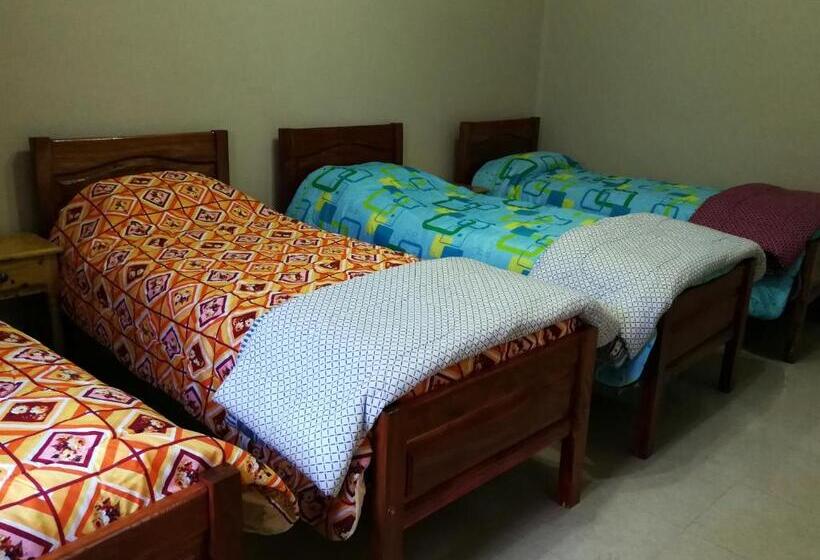 Bed in Shared Room with Shared Bathroom, Tierra Nuestra