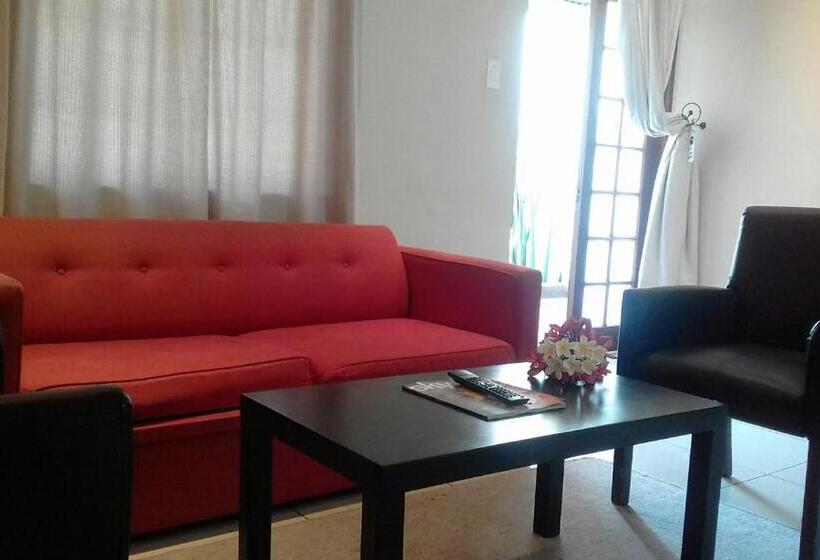 اتاق خانوادگی با چشم‌انداز باغ, Cu Guest House