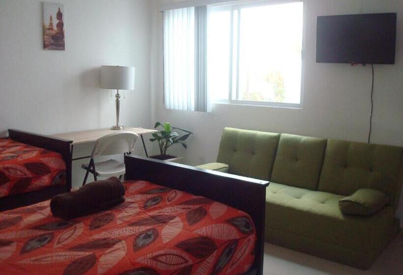 اتاق استاندارد سه تخته با سرویس بهداشتی مشترک, Casa Mariel