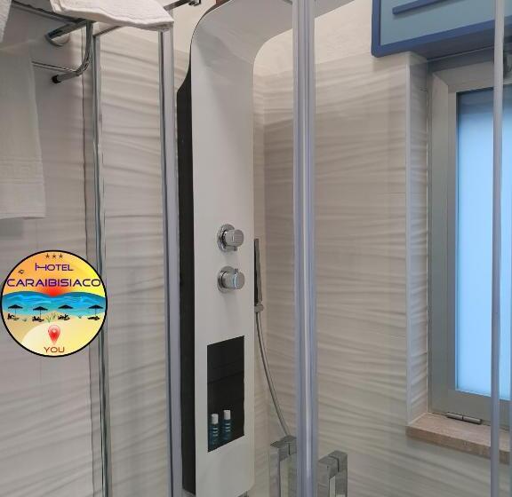 اتاق استاندارد چهار تخته با چشم‌انداز دریا, Caraibisiaco Sul Mare