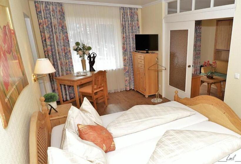اتاق خانوادگی با چشم‌انداز باغ, Flairhotel Am Wörthersee