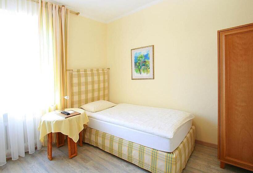 Quarto Individual Clássico, Garni Golf