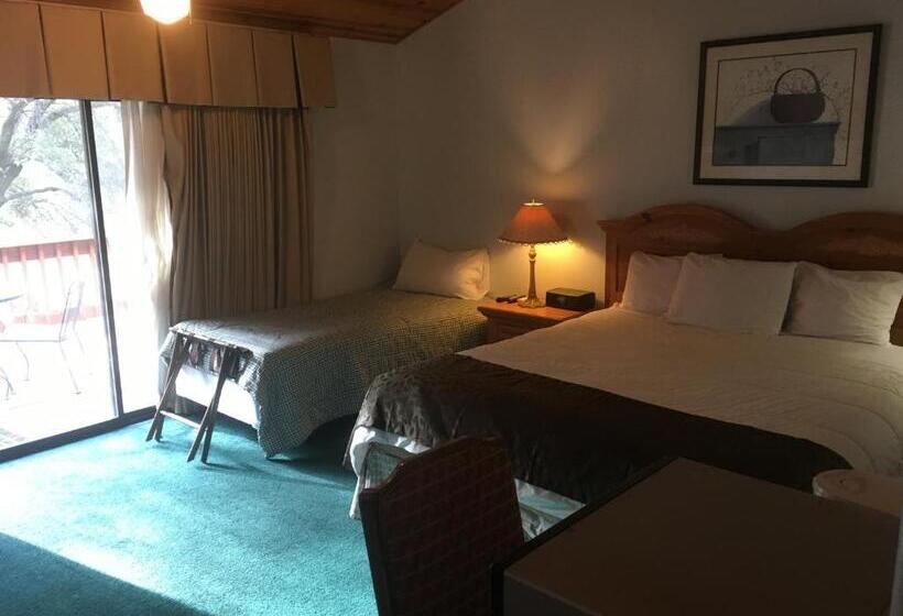 غرفة قياسية فردية سرير كينج, Whispering Pines Lodge