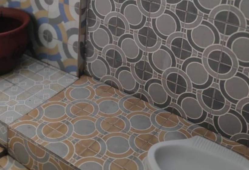 Кровать в Общей Комнате, Homestay Rahayu