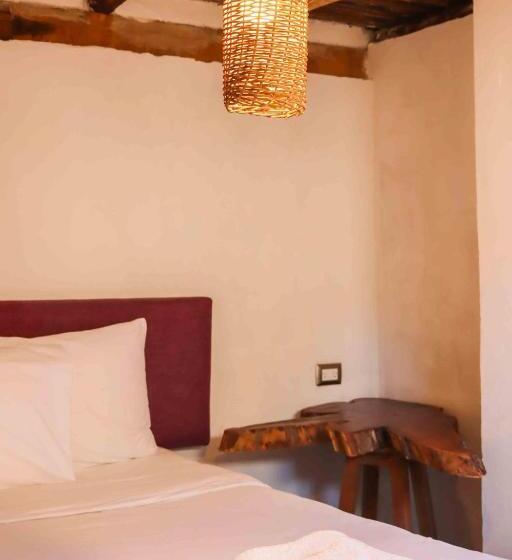 اتاق استاندارد سه تخته با چشم‌انداز باغ, Casa Mate Beachfront Cabañas El Cuyo
