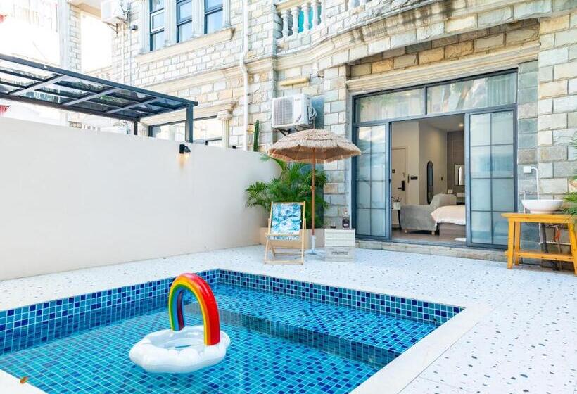 اتاق سوپریور با چشم‌انداز باغ, Beihai Silver Beach Yintai Time Seaview Villa