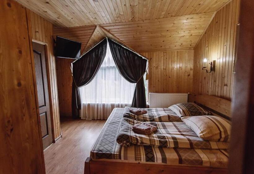 سوییت با چشم‌انداز کوه, Toga Cottage