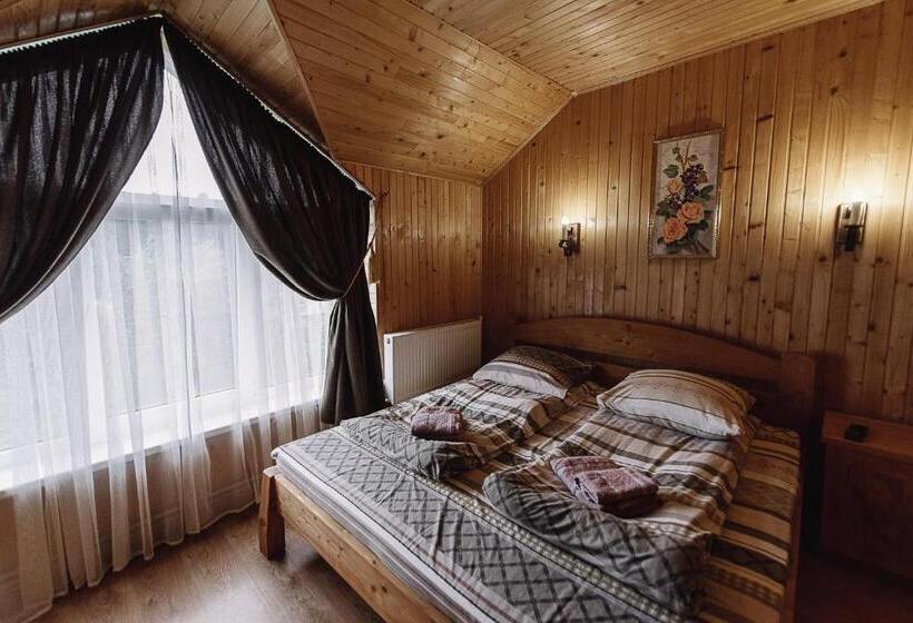 سوییت با چشم‌انداز کوه, Toga Cottage