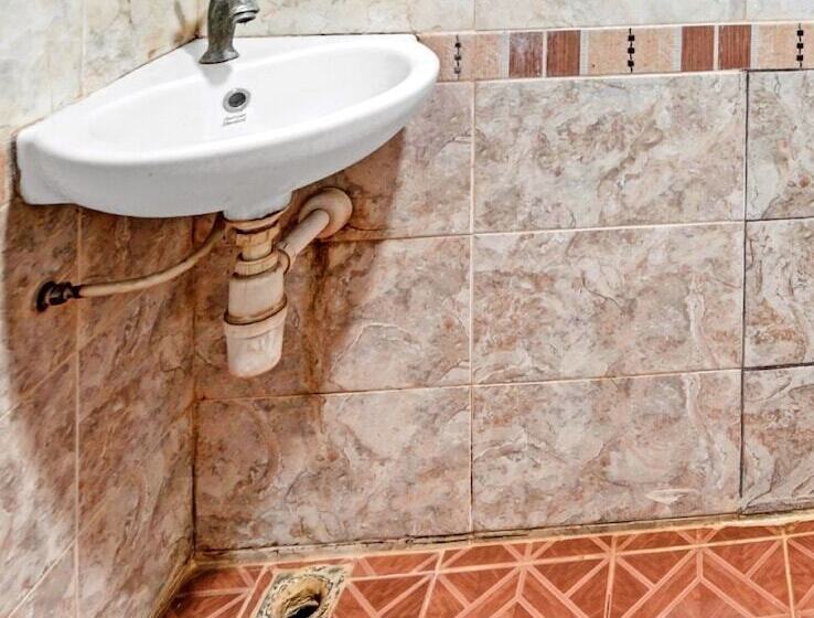 Номер Deluxe, Oyo 90487 Wisma Kuta Karang Baru