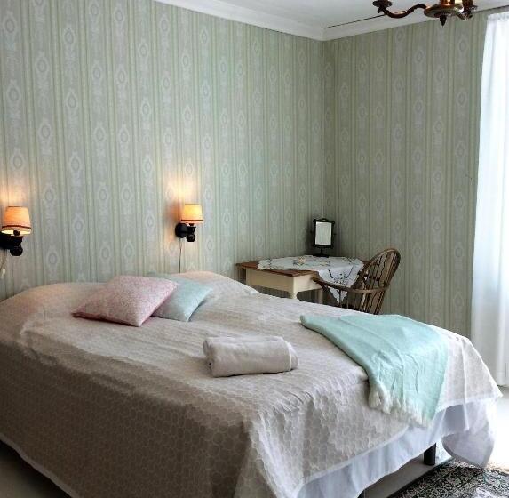 Quarto Triplo Estandar, Tiittalan Kartano
