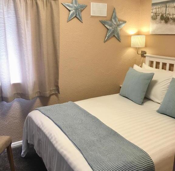 Quarto Familiar Comunicado, Corona Blackpool