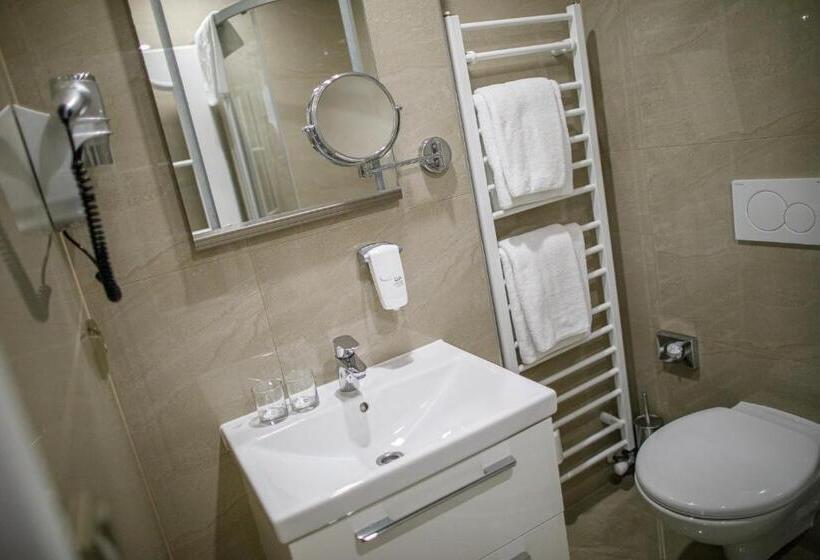 Quarto Triplo Estandar, Villa Basileia Riverside