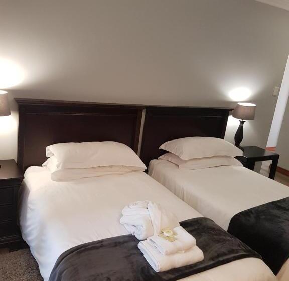 Quarto Deluxe, Cornerstone Guest Lodge