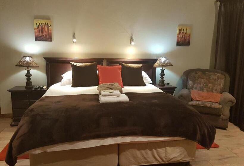 Quarto Deluxe, Cornerstone Guest Lodge