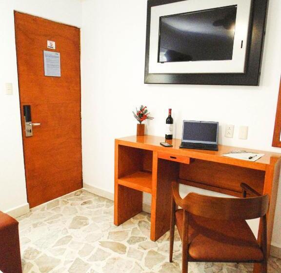 Quarto Estandar Cama King, River Poliforum