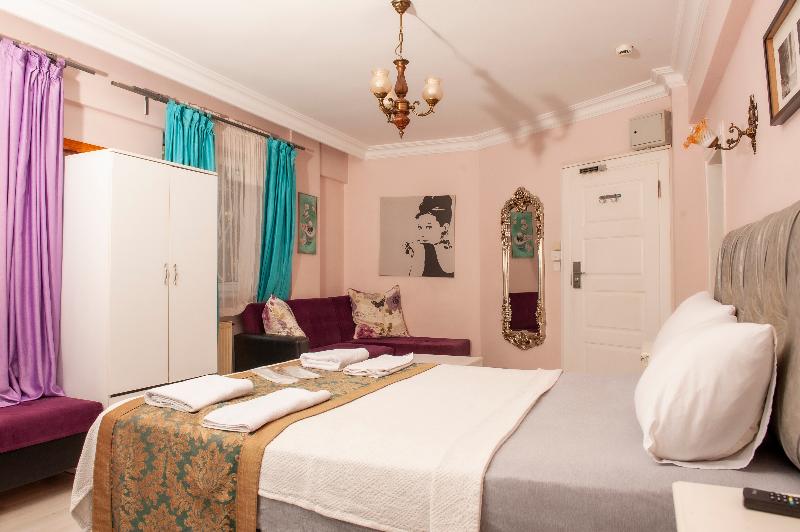 اتاق استاندارد سه تخته با چشم‌انداز باغ, Yesim Suites