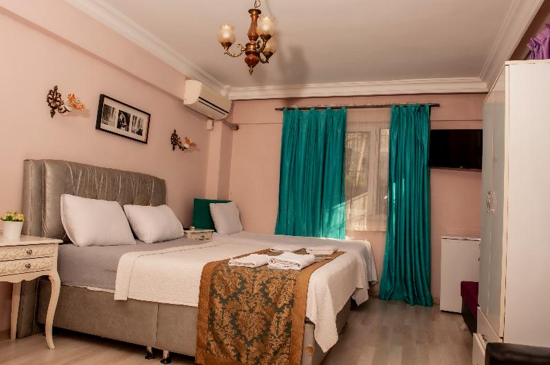 اتاق استاندارد سه تخته با چشم‌انداز باغ, Yesim Suites