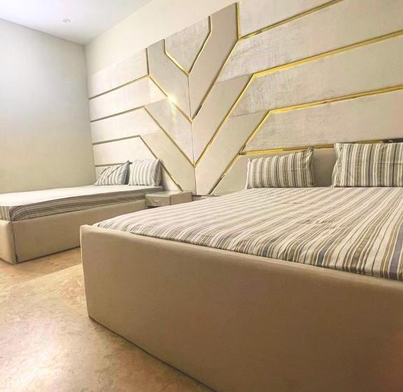 Economy Triple Room, The Value Guest House Near Airport