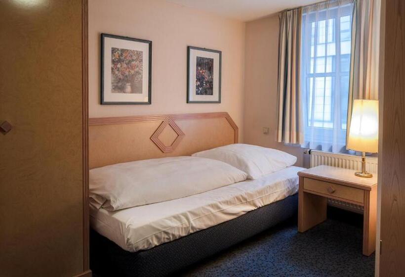 Quarto Economy Individual, Stäffele City Appartements
