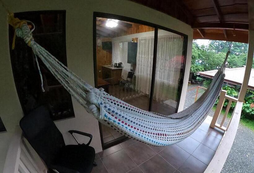 Quarto Quadruple Standart Vista Jardim, Laureles Collection Uvita   Cabinas Los Laureles