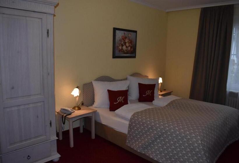 Номер Economy, Mutz