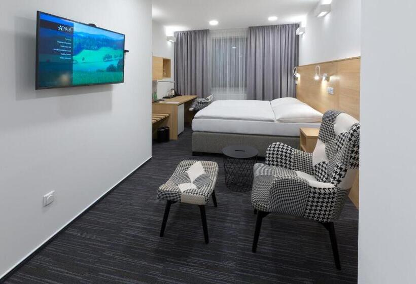 Deluxe Kamer, Ala