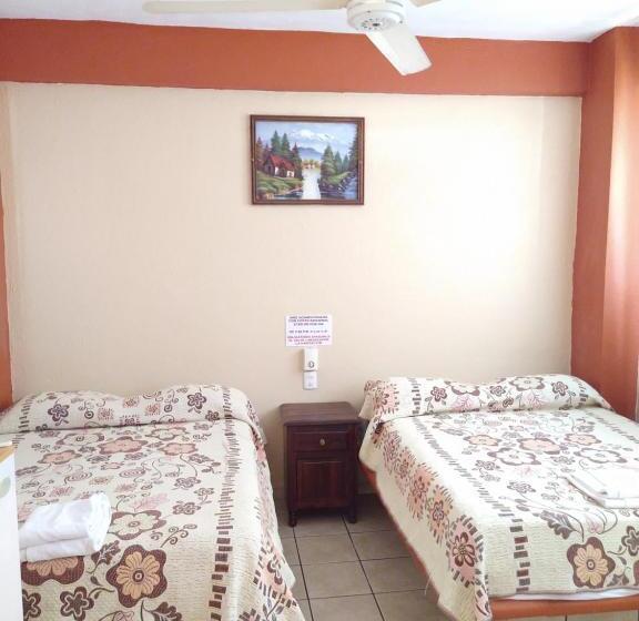 Quarto Quádruplo Estandar, Y Bungalows Olivares