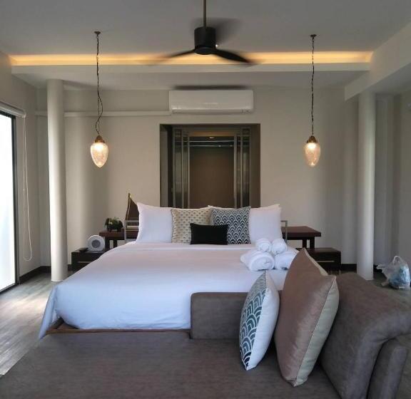 اتاق خانوادگی با چشم‌انداز باغ, Tungtong Beach Villas