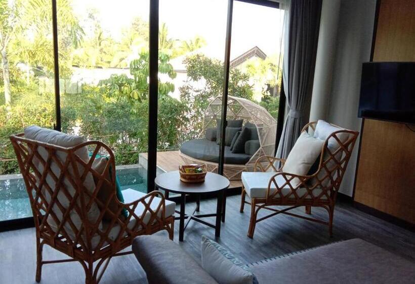 اتاق خانوادگی با چشم‌انداز باغ, Tungtong Beach Villas