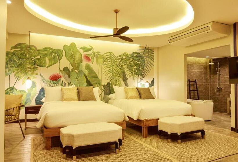 اتاق خانوادگی با چشم‌انداز باغ, Tungtong Beach Villas