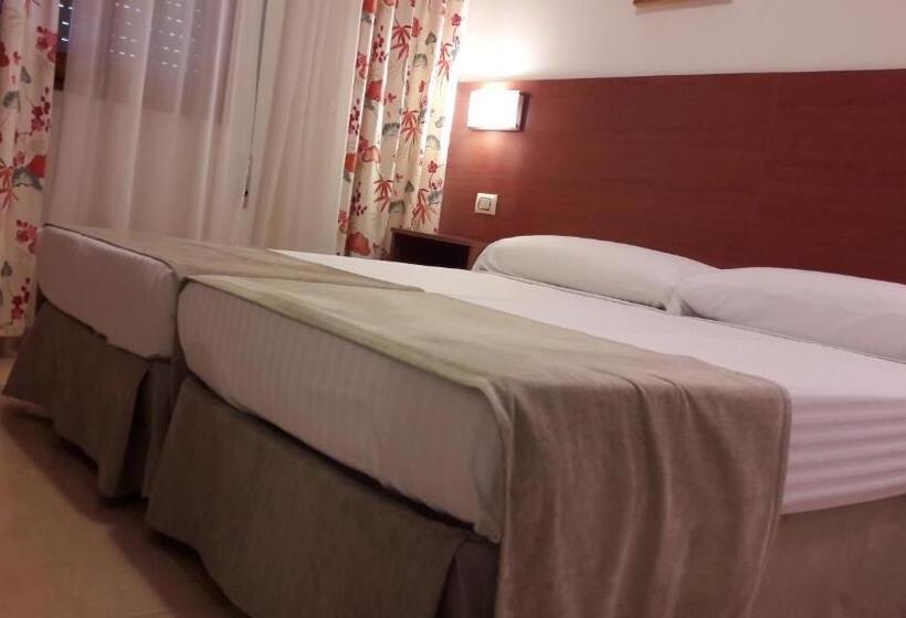 Номер Economy, Torres Touriño