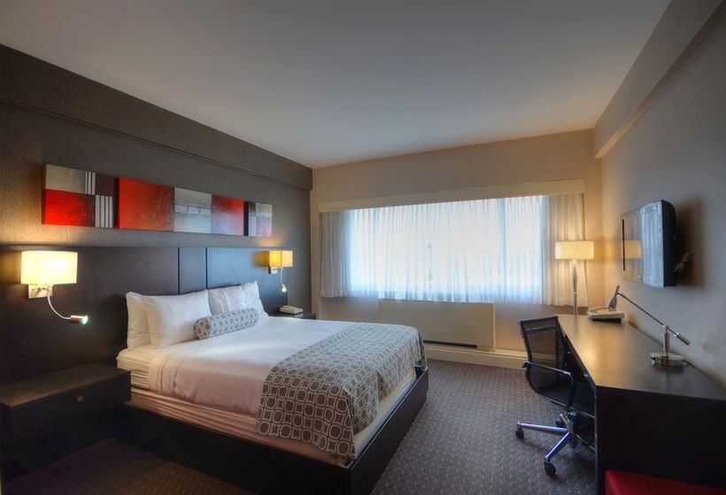 キングサイズベッドのスイートルーム, Armon Plaza Montreal Airpt, Trademark Collection By Wyndham