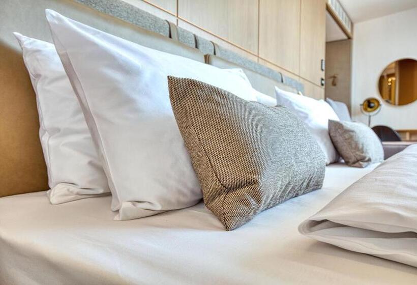Quarto Classe Business, Meilenstein