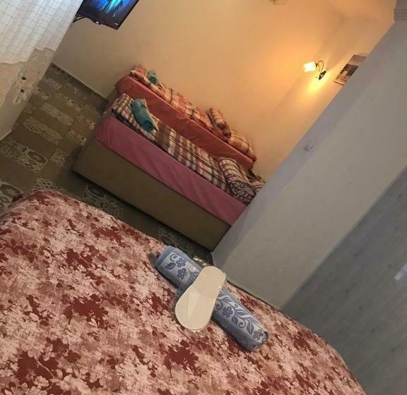 سوییت خانوادگی, Halikarnas Pansiyon