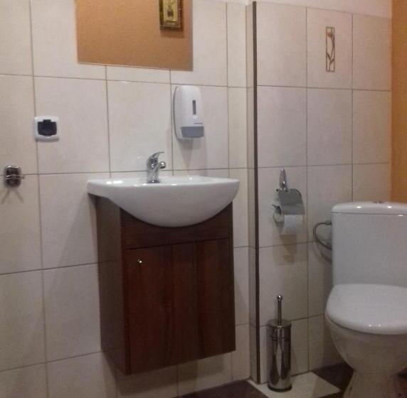 Quarto Familiar Clássico, Dom Gościnny Gerus